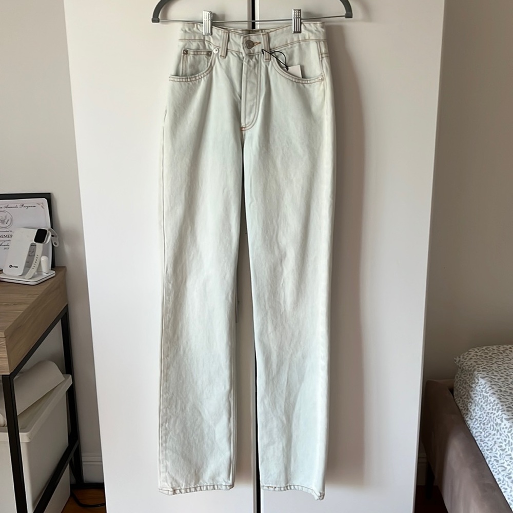 white Zara jeans with orange stitching